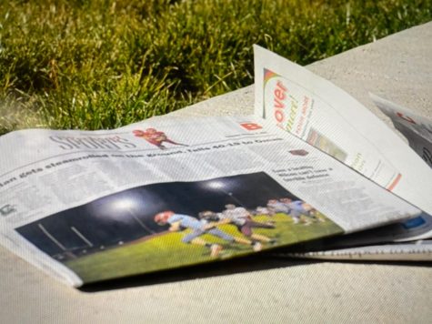 Reporter Alejandro Ramirez questions the future of printed newspapers.  The local sports section awaits on the front step.