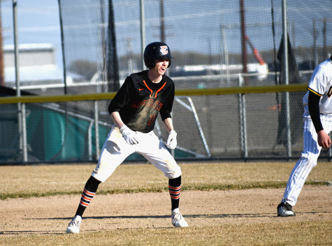 Justin Billingsley (12) leads off during the Tuesday afternoon game at Quincy. (March 22, 2022)